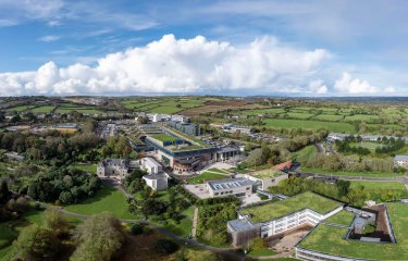 Panoramic view of Penryn Campus with buildings and trees