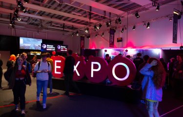 A large 'Expo' sign greets arrivals at the 2022 Games Expo