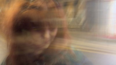 A blurred image of a person