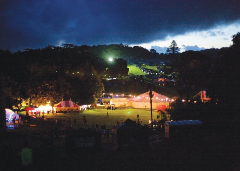 Port Eliot festival at night with a view of the tents