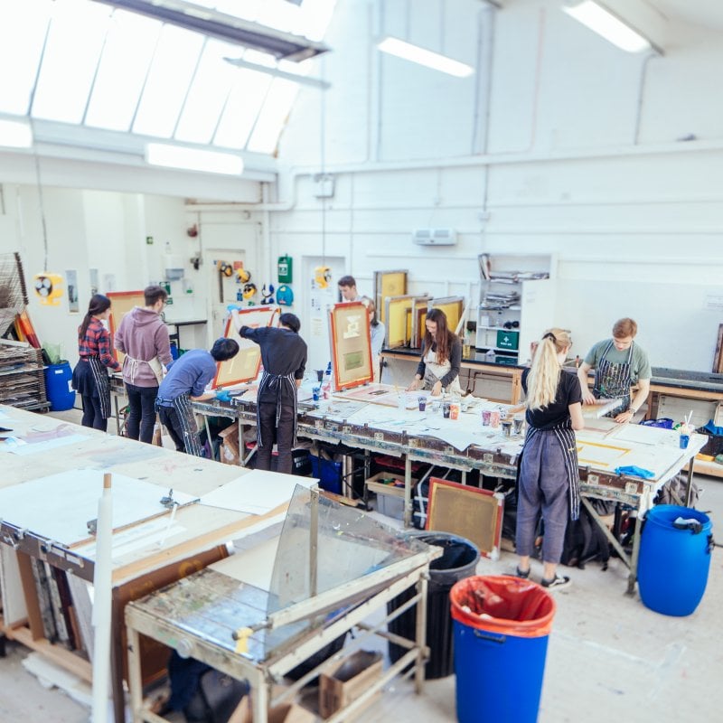 Students working in studio at a table