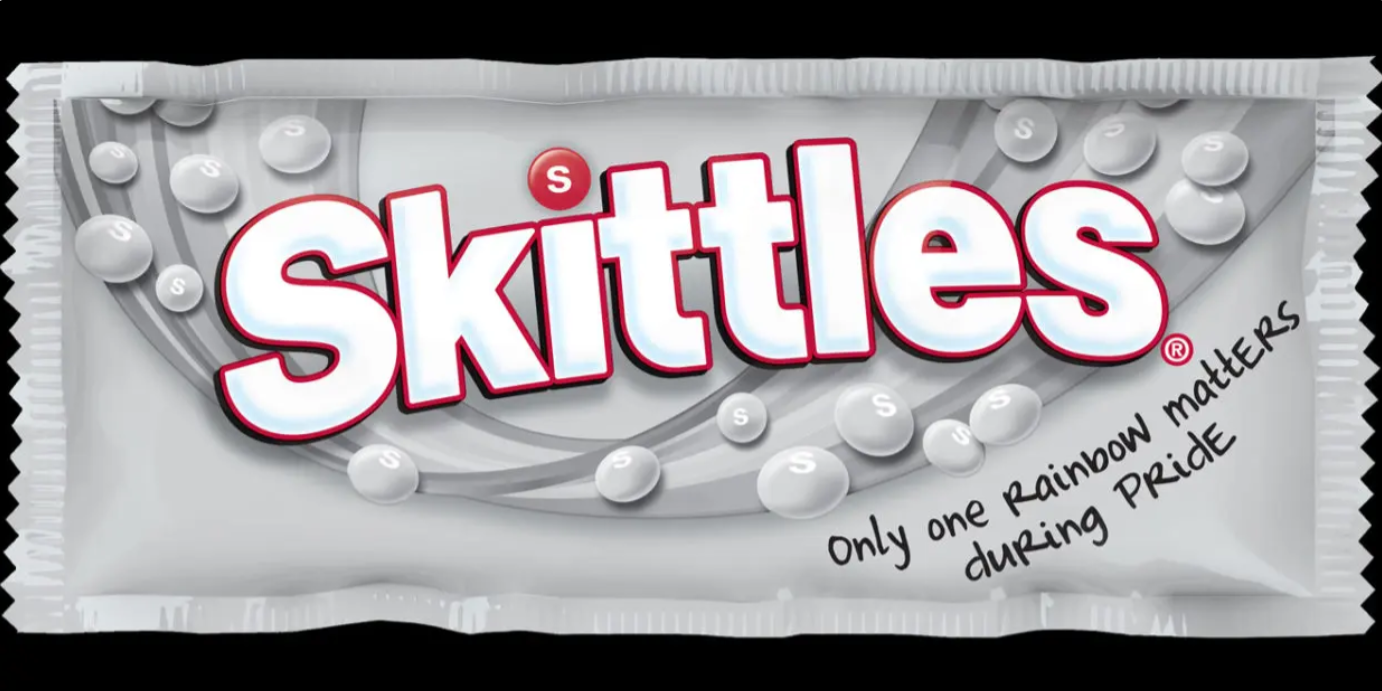 Black and white pack of skittles produced in support of Pride