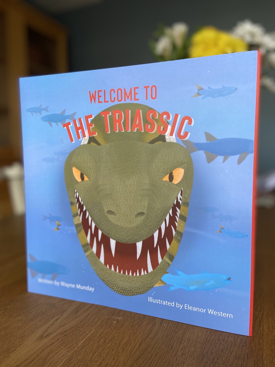 Welcome to the Triassic book cover with green dinosaur on the front
