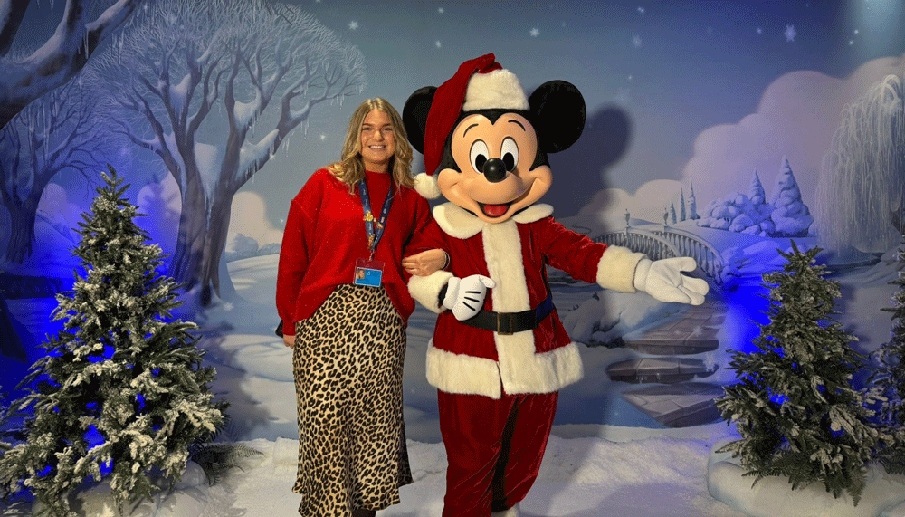 A woman with Minnie Mouse