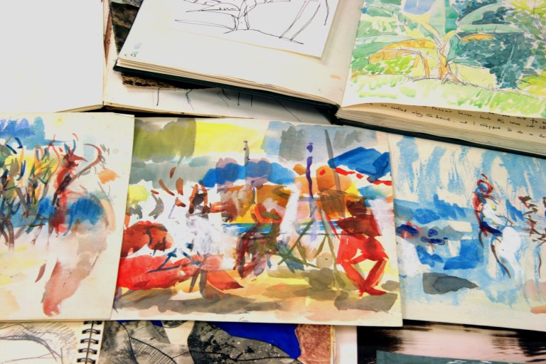 Collection of colourful artworks on paper by artist Tom Cross