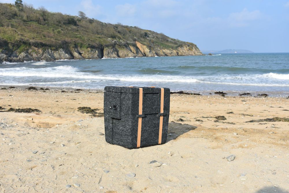 WoolBox Cooler (designed by Falmouth University graduate) on a beach