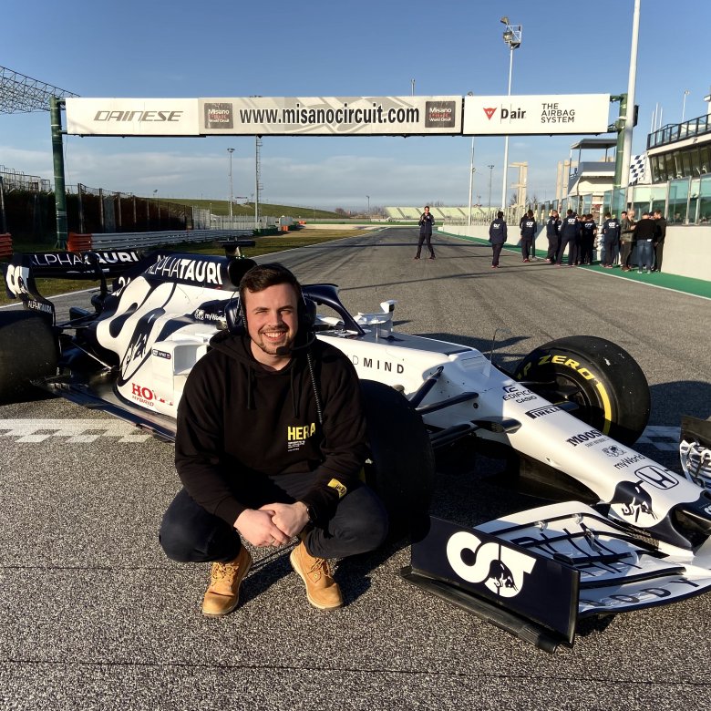 Elliott Harrison with Formula 1 car
