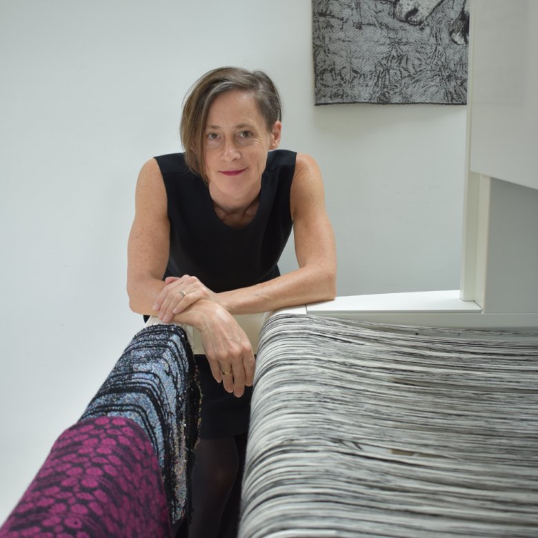 Fiona Sperryn In a textile studio with a weave