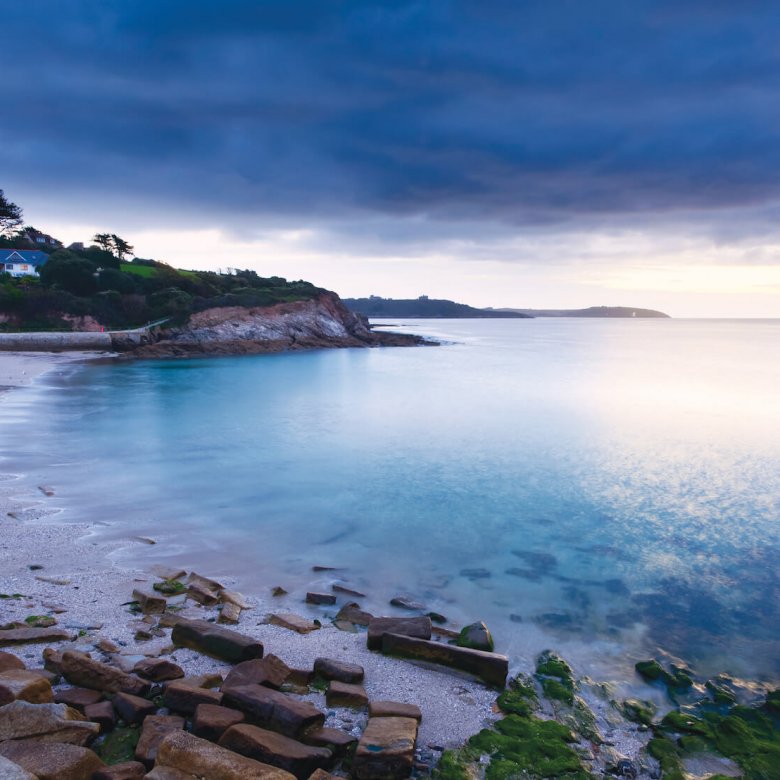 View of Swanpool beach at dusk