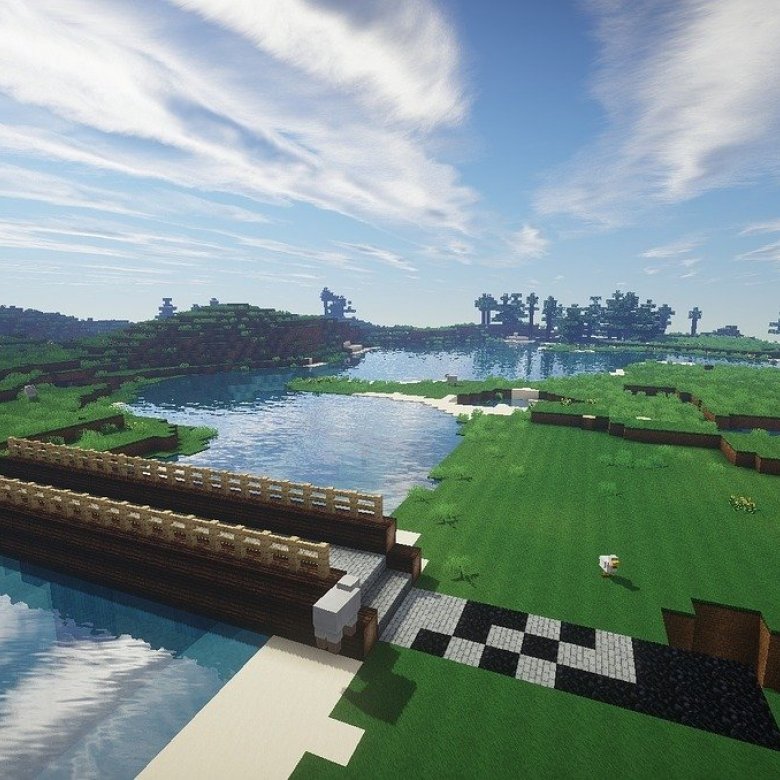 A Minecraft image still of bridge over river of water and fields in the background