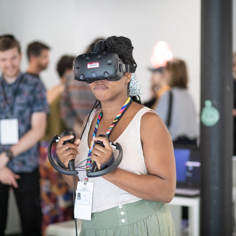 Lady using Virtual Reality equipment