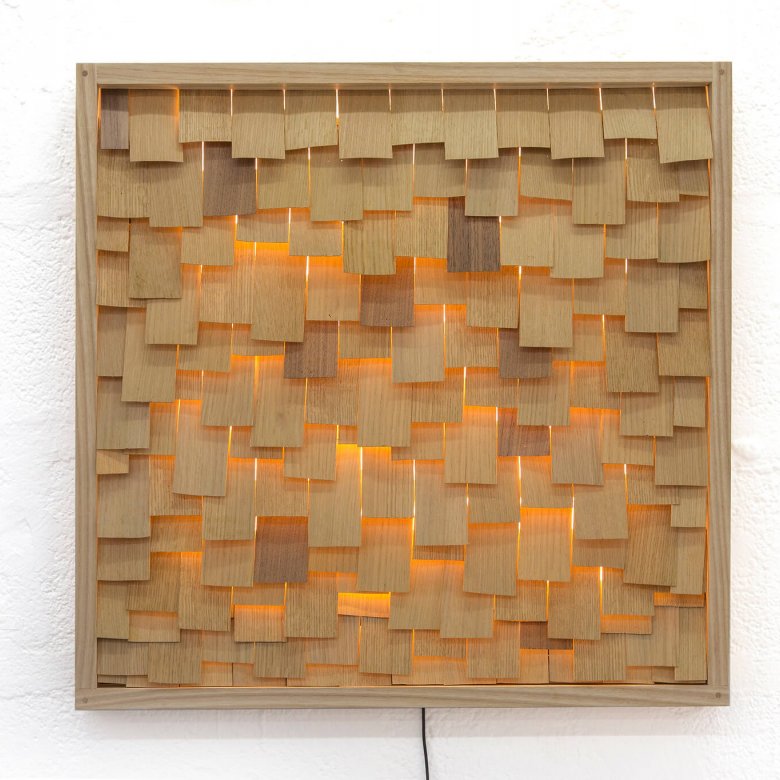 Product design of a wooden frame with wooden strips illuminated