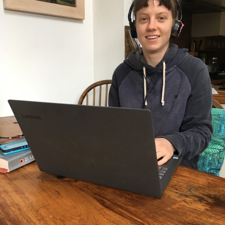 student records her contribution for the first radio show from her dining table at home