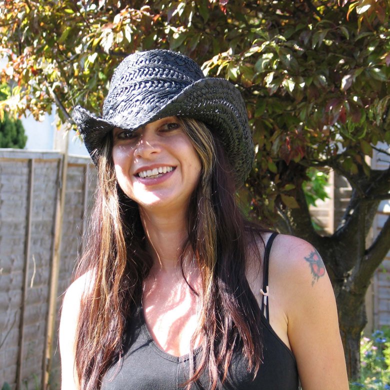 Tanya Krzywinska staff profile image with a hat