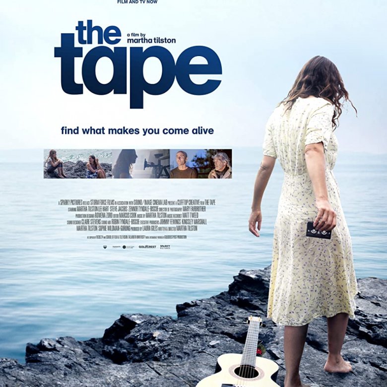 Film poster for 'The Tape'. A woman in a white dress with her back to us, a guitar at her feet.