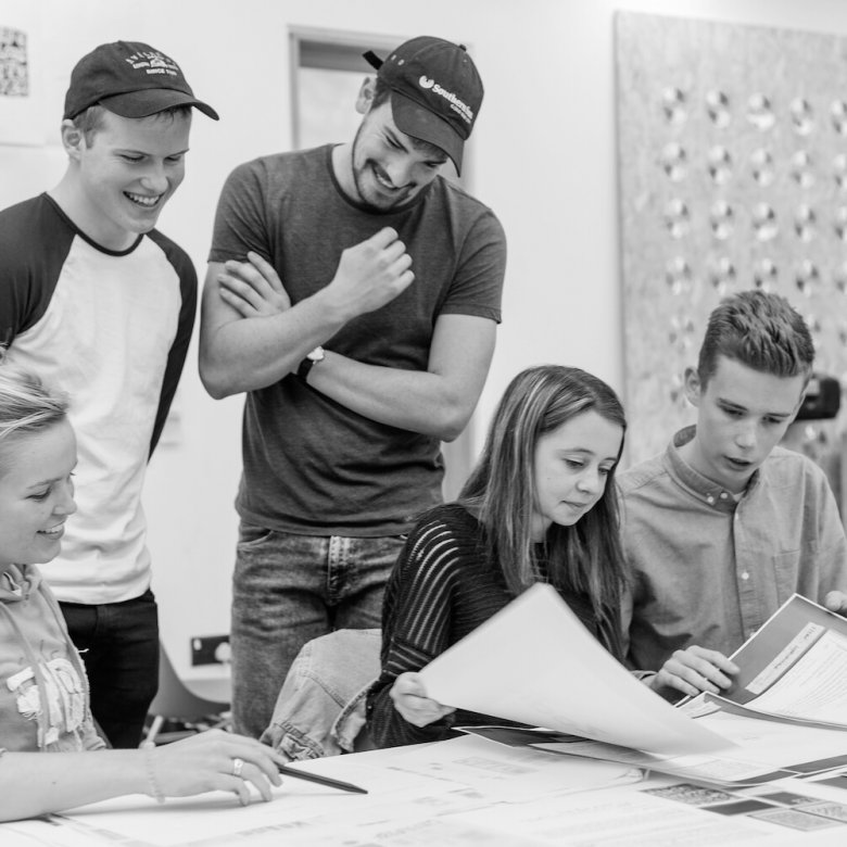 Students working in the Graphic Design Studio at Falmouth University