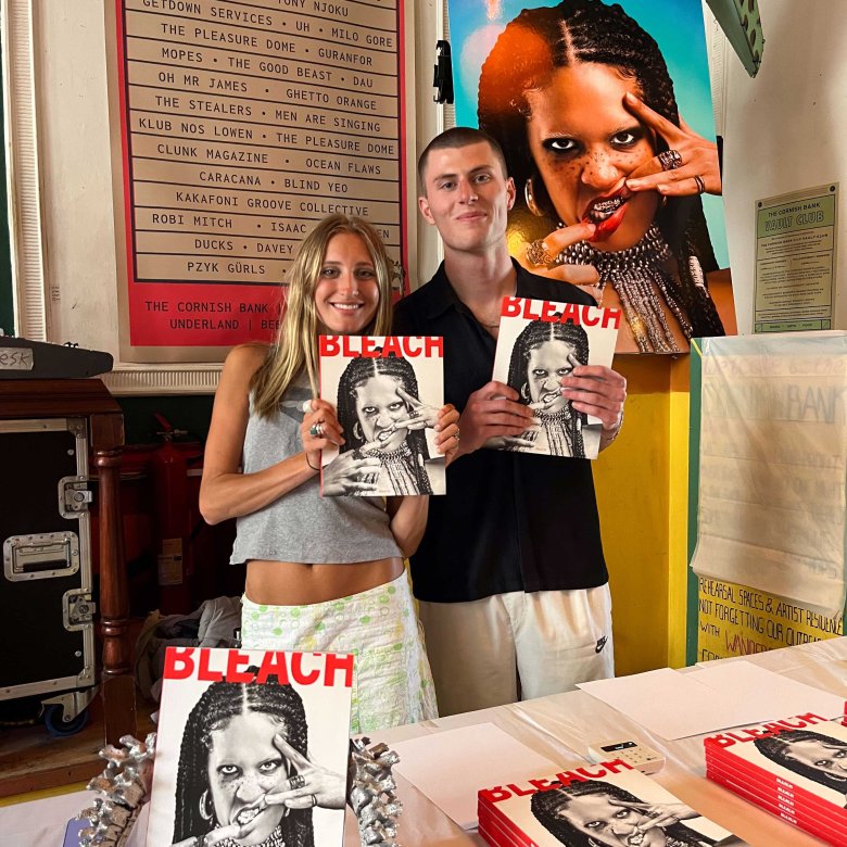 Montana Cooke and Alex Wilson holding their magazine entitled Bleach