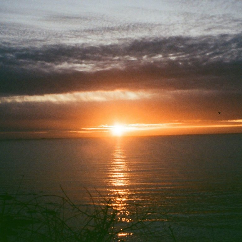 Orange sunset over the sea in Cornwall