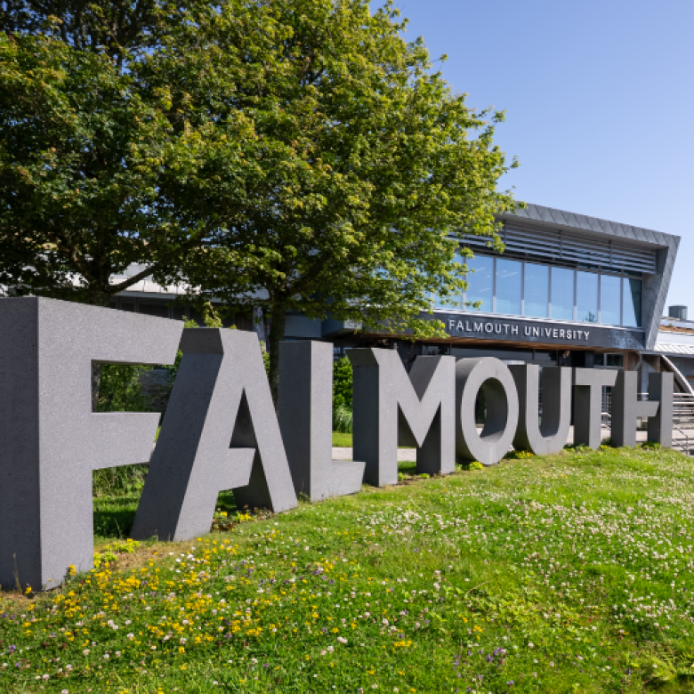 External shot of Falmouth University logo signage on campus