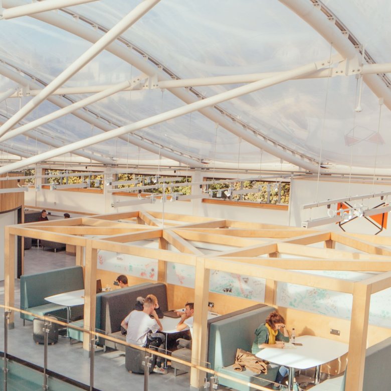 Students sit in a cafe