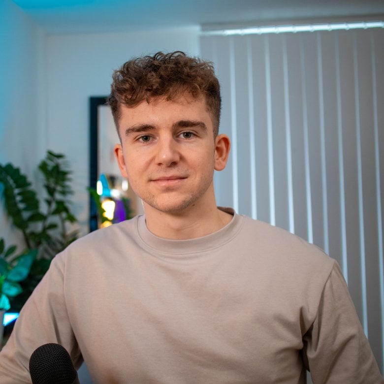MA UX Design graduate Jack Jenkins sitting in his home office