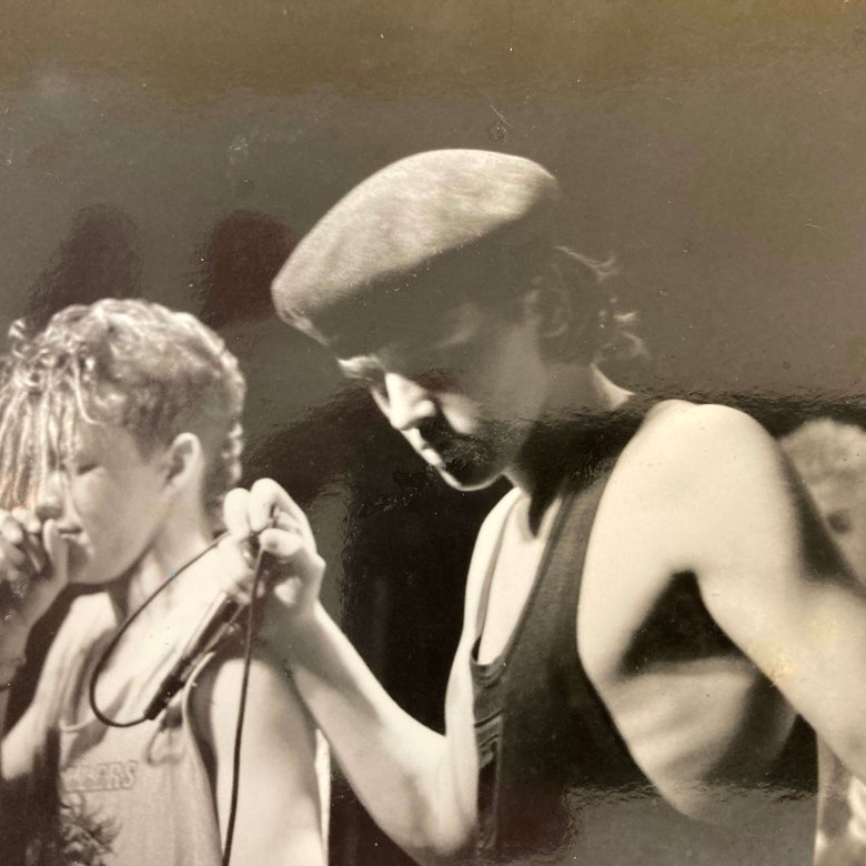 Black and white photo of band 'Five Minute Fashion' playing at Victor Dragos in Falmouth in 1990.