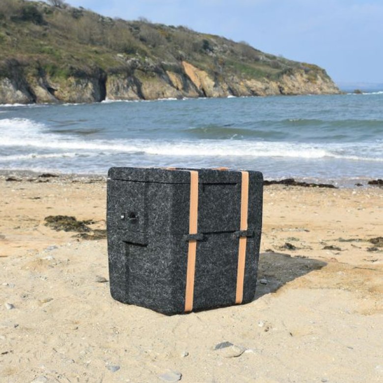 WoolBox Cooler (designed by Falmouth University graduate) on a beach