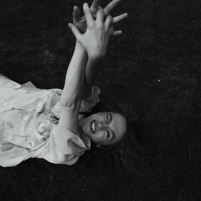 A girl lying in a field
