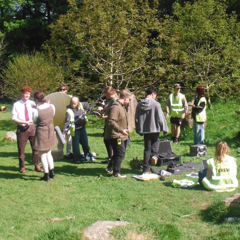 A group of students at Falmouth University preparing filming equipment