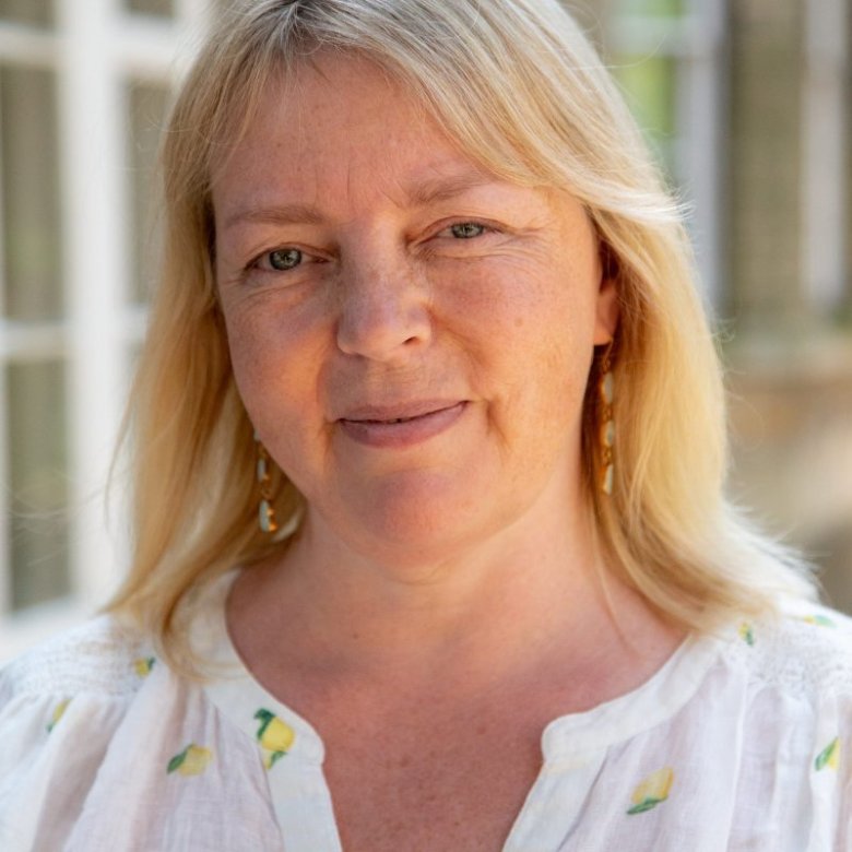 A headshot of academic Amber Burton 