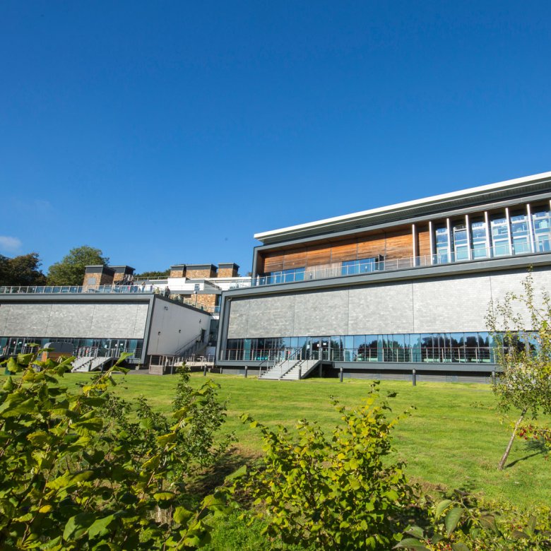 The AMATA Arts Centre building on a sunny day