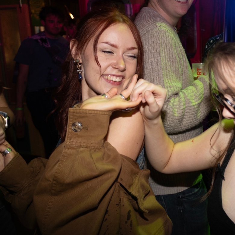 Daisy Thompson dancing with a friend, Falmouth University