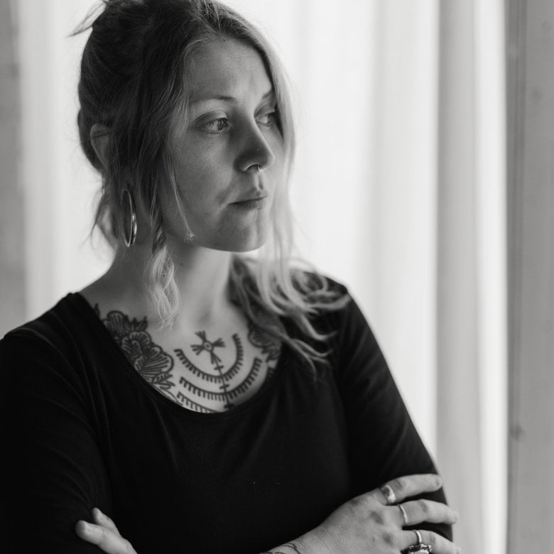 A woman stood in her studio