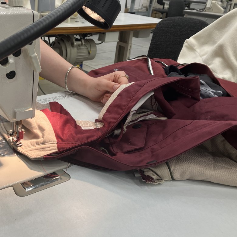 A student using a sewing machine