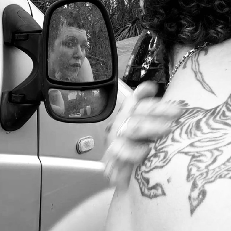 A woman looking out the car window