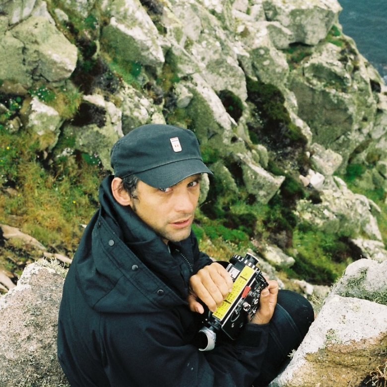 Mark Jenkin poses with his Kodak B&W camera