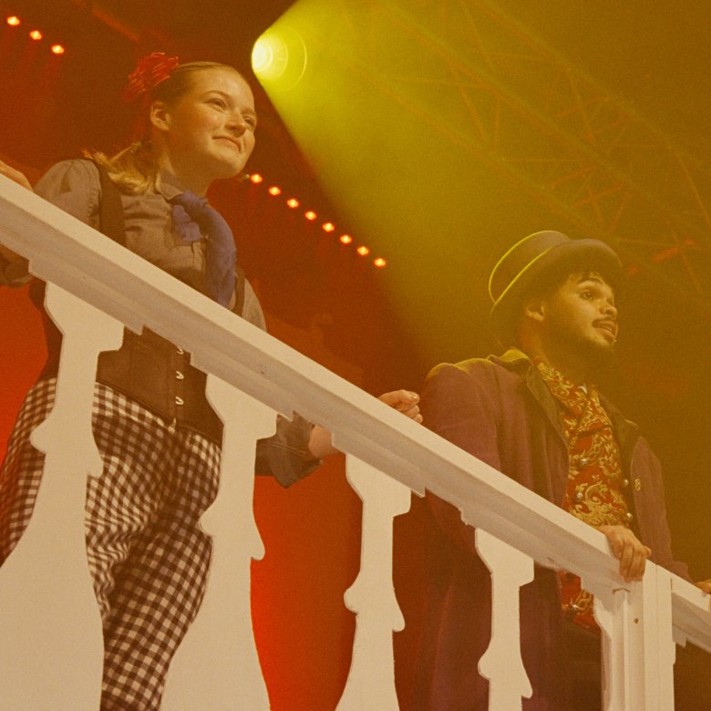 Image of two actors on stage