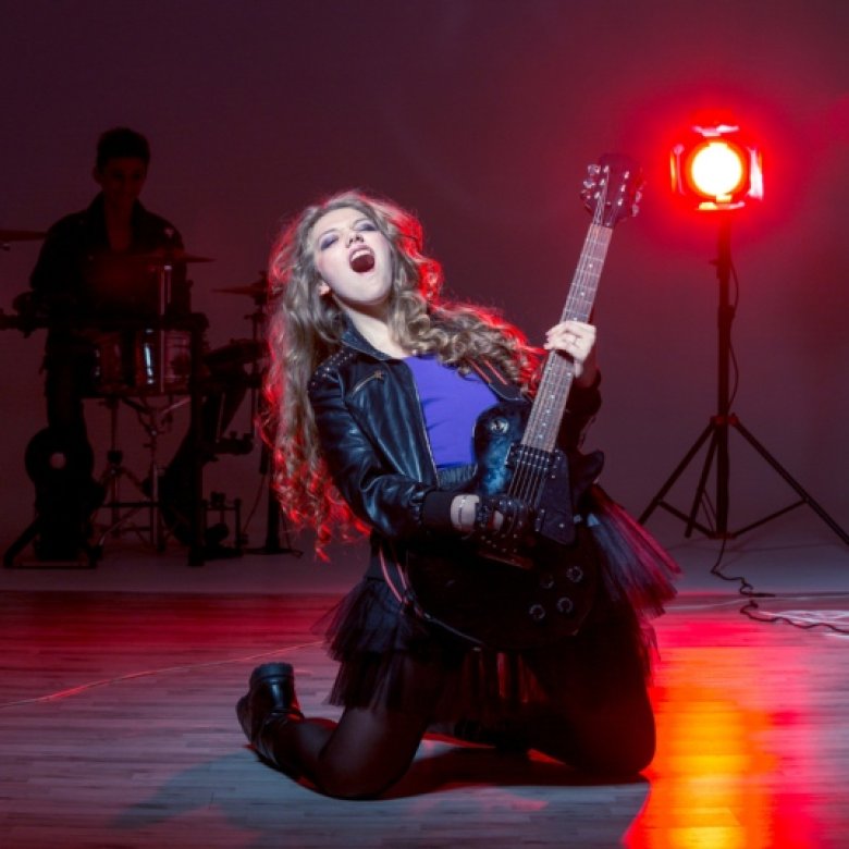 A woman drops a guitar solo