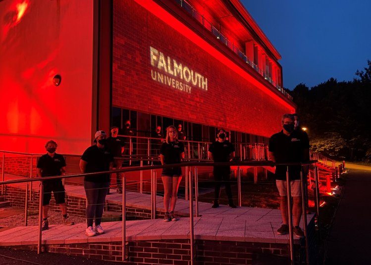 Falmouth University AMATA building shines red in support of #WeMakeEvents