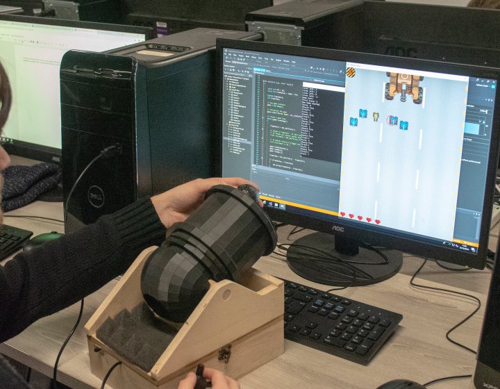 Games student using cannon controller