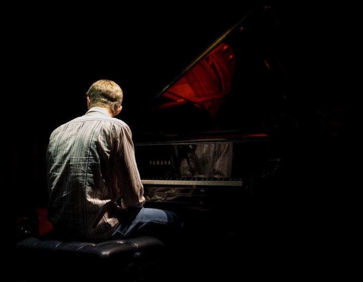 student at piano