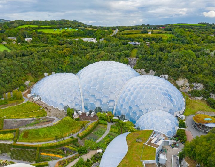 Aerial view of the Eden Project domes with fields and sky