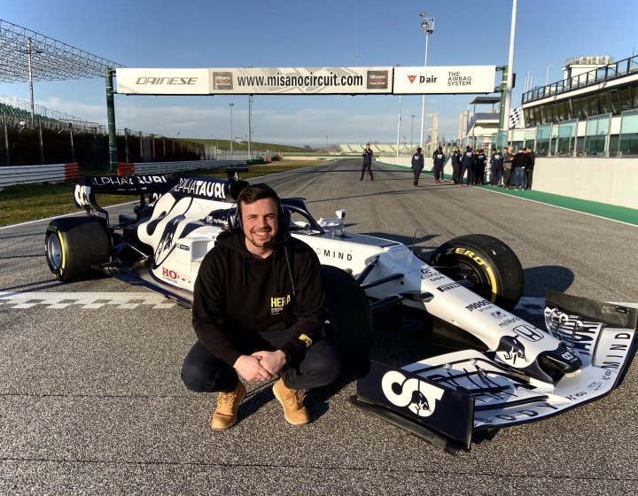 Elliott Harrison with Formula 1 car