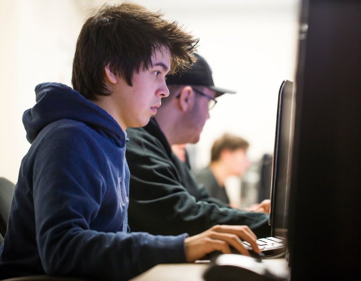 male student at a computer