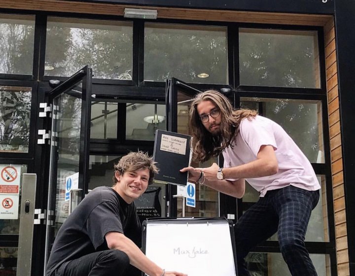 Max and Jake outside the School of Communication