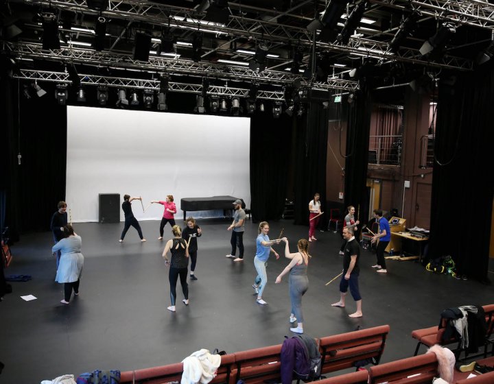 Students in a stage fighting workshop in AMATA studio