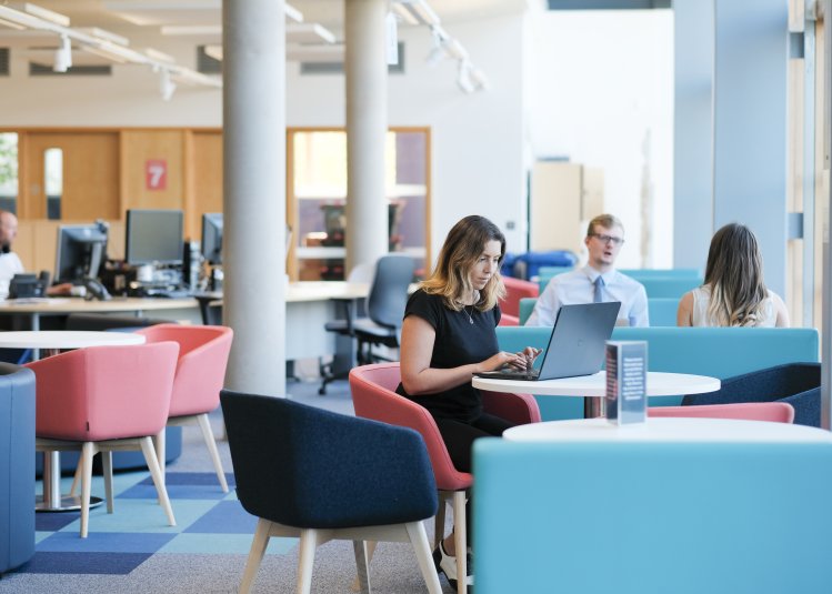 Staff working on laptops.