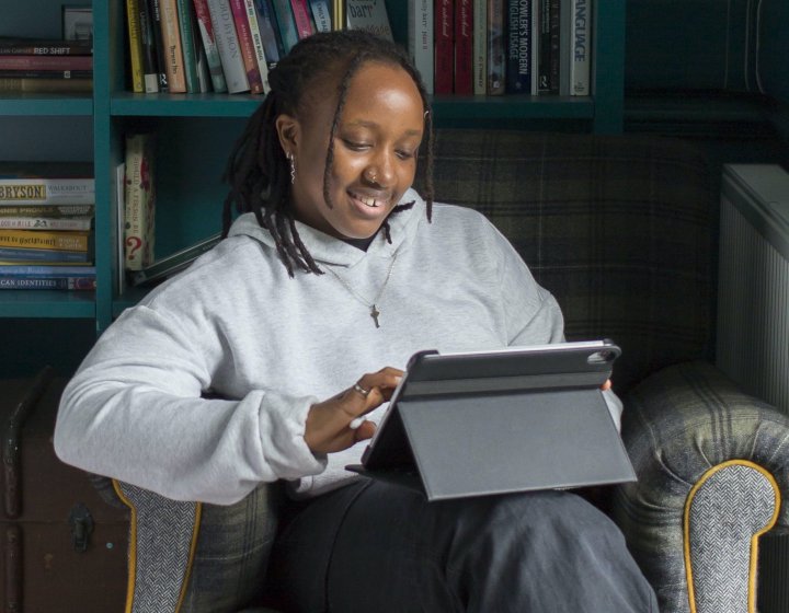 PGCHE student on an iPad