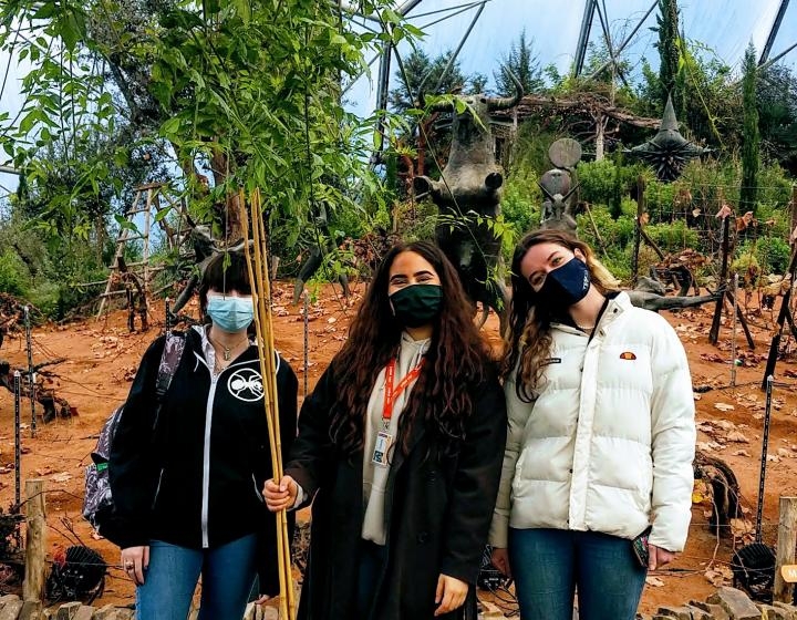 Three students stood together at The Eden Project, Cornwall