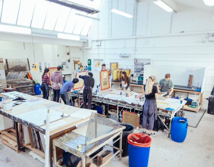 Students working in studio at a table